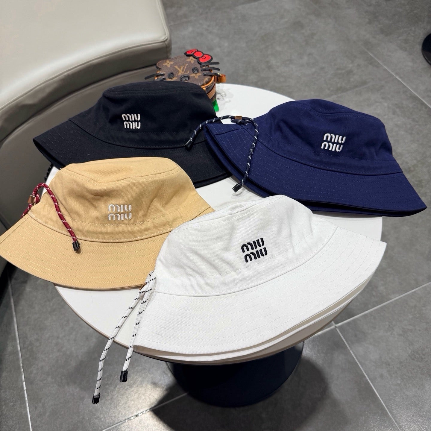 MIUMIU BUCKET HAT STYLE 84
