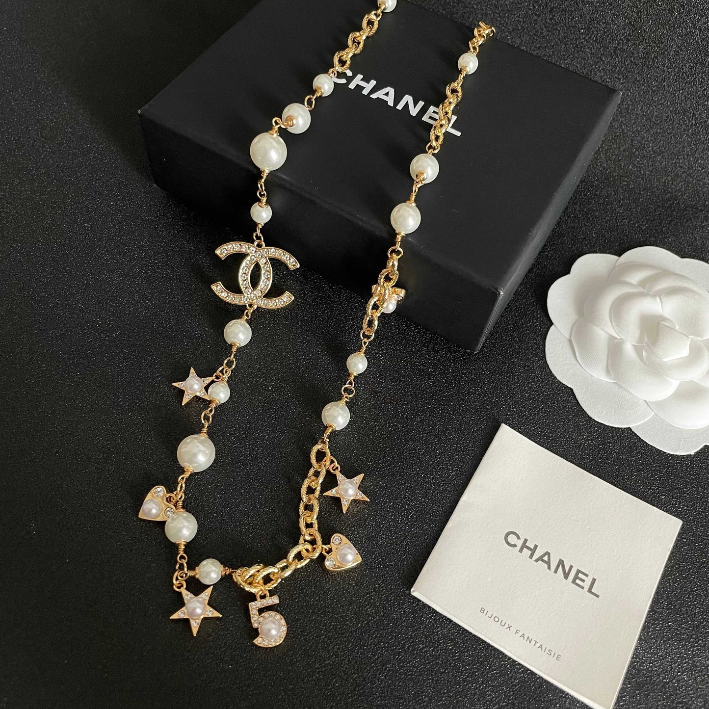 CHANEL 26S DOUBLE C LOGO PEARL CHARM NECKLACE WITH STAR AND HEART DETAILS IN GOLD METAL 631895
