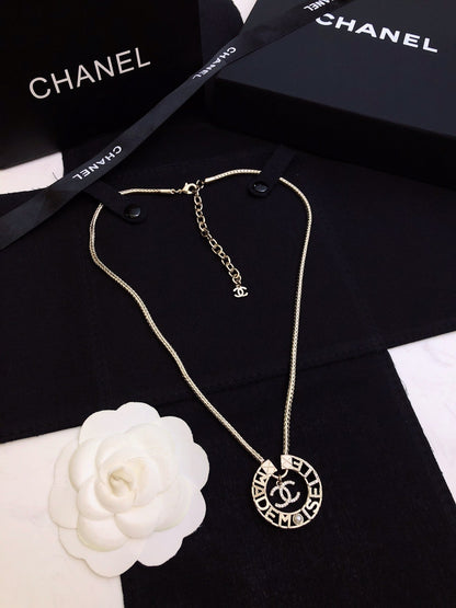 CHANEL 26S CHANEL CC LOGO MADEMOISELLE ROUND NECKLACE IN GOLD METAL 633322