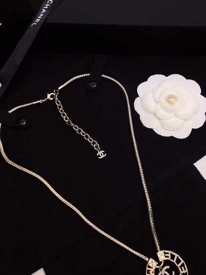 CHANEL 26S CHANEL CC LOGO MADEMOISELLE ROUND NECKLACE IN GOLD METAL 633322