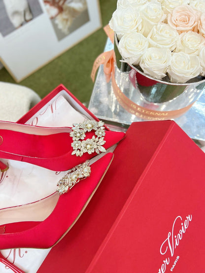 EFFLORESCENCE POINTED-TOE PUMPS IN RED SATIN WITH CRYSTAL BUCKLE