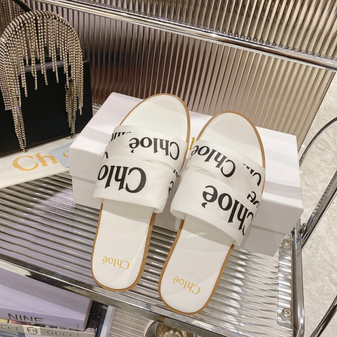 CHLOÉ WOODY SLIPPER IN WHITE MIX BLACK CANVAS