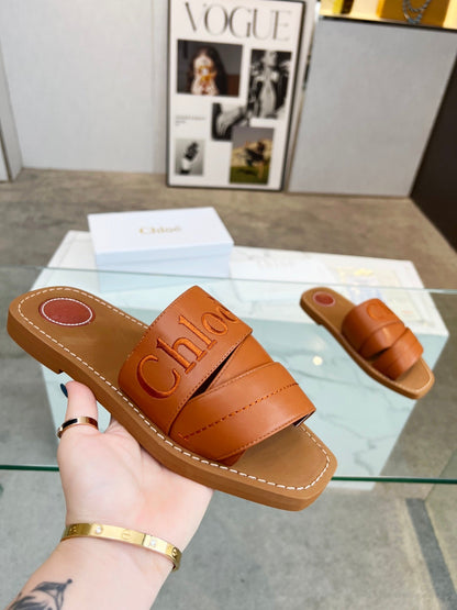 WOODY MULE IN BRONZE BROWM LAMBSKIN WITH EMBROIDERED LOGO