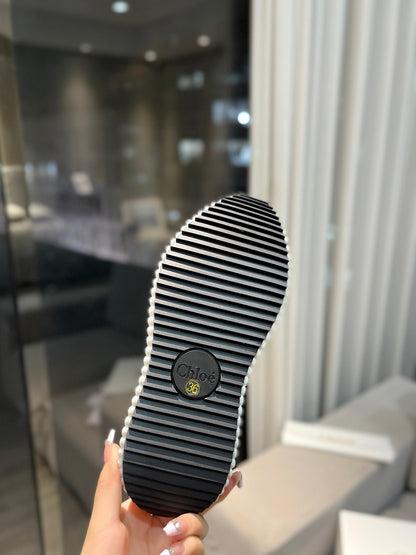 CHLOÉ NAMA SNEAKER IN WHITE LAMBSKIN AND BLACK SUEDE