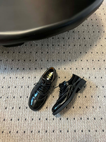 MIUMIU 26S LACE-UP BROGUE LOAFERS IN BLACK PATENT CALFSKIN