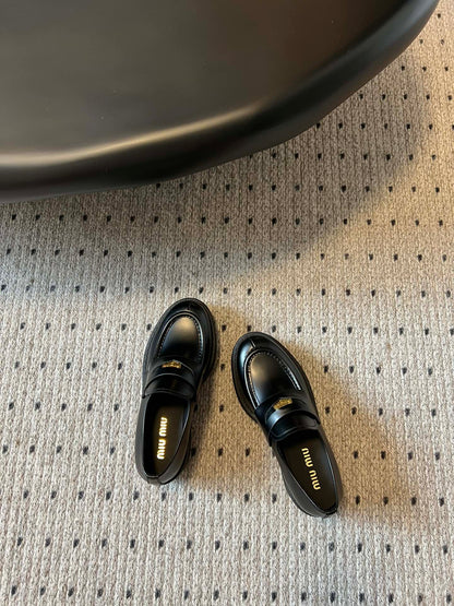MIUMIU 26S LOAFERS IN BLACK BRUSHED CALFSKIN