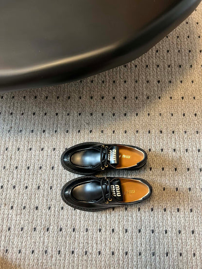 MIUMIU 26S LACED FUME SHOES IN BLACK GLOSSY CALFSKIN