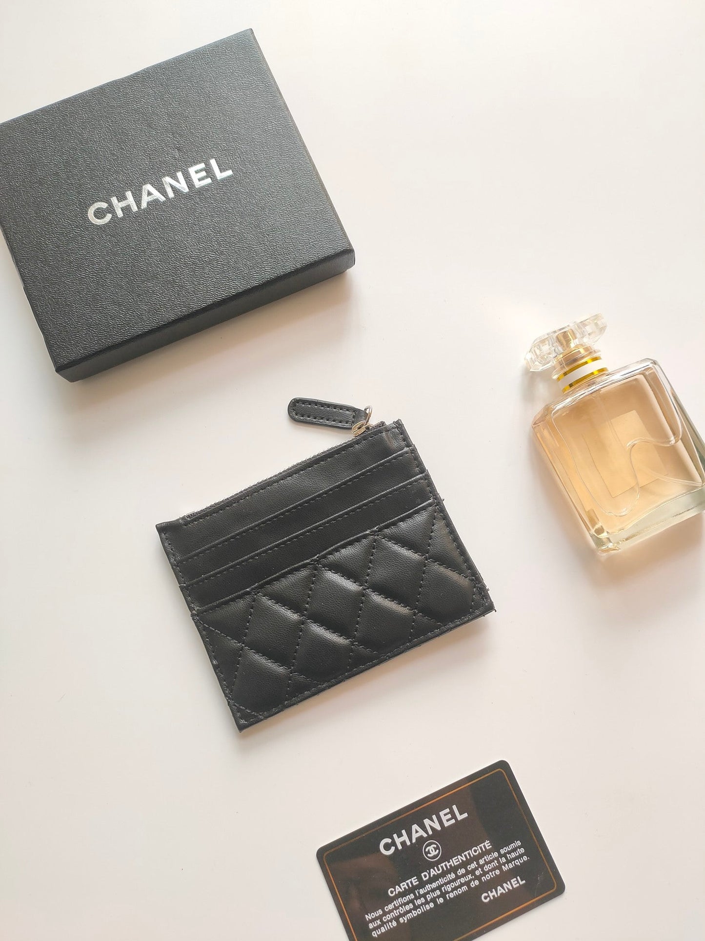 CC ZIPPED CARD HOLDER 11.5 BLACK CALFSKIN
