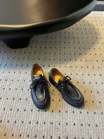 MIUMIU 26S LACED FUME SHOES IN BLACK CALFSKIN