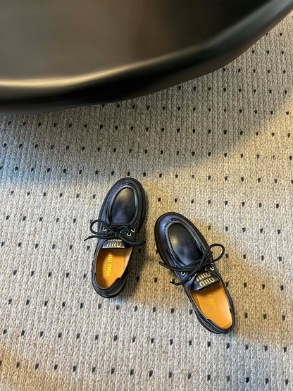 MIUMIU 26S LACED FUME SHOES IN BLACK CALFSKIN