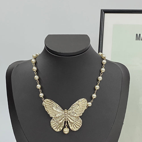 CD 26S PEARL STRAND BUTTERFLY PENDANT NECKLACE IN GOLD METAL 633112