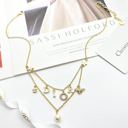 CD 26S MULTI CHARM LAYERED DIOR NECKLACE WITH PEARL DROP IN GOLD TONE 631779