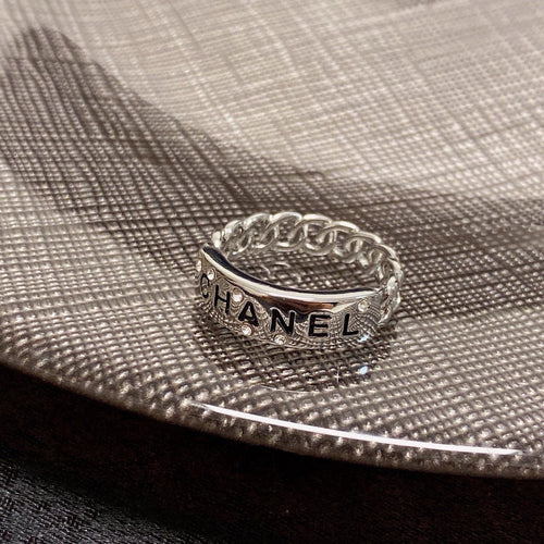 CC  RING LETTER DOUBLE C IN SILVER DIAMOND BLACK EMBOSSED LOGO