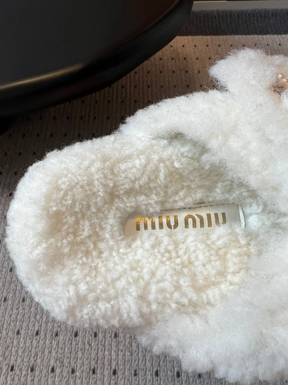 MIUMIU 26S SHEEPSKIN SLIPPERS IN WHITE