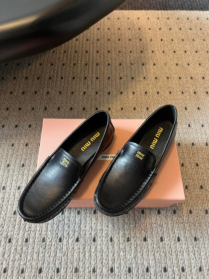 MIUMIU 26S LOAFERS IN BLACK CALFSKIN