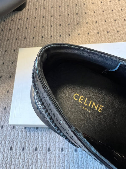 CELINE 26S SAINTNJORD TASSEL LOAFER 50 MM IN BLACK CALFSKIN