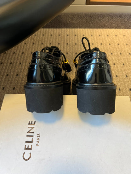 CELINE 26S SAINTNJORD TASSEL LOAFER 50 MM IN BLACK CALFSKIN