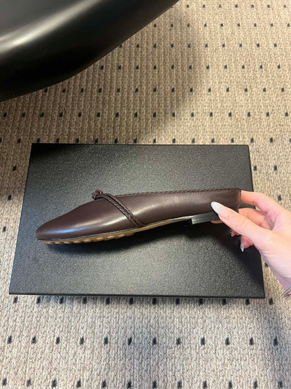 BOTTEGA VENETA 26S FLAT MULES IN DARK BROWN LAMBSKIN