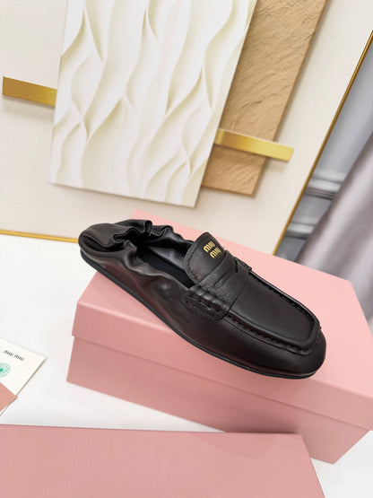 MIUMIU 26S RUCHES LOAFERS IN BLACK LAMBSKIN