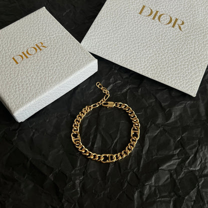 CD 26S LOGO LINK CHAIN BRACELET IN GOLD METAL 633146