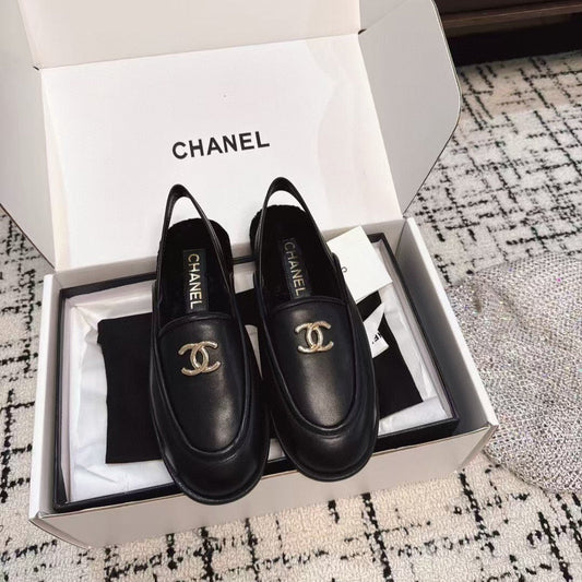 SLINGBACK LOAFER IN BLACK CALFSKIN AND SHEARLING