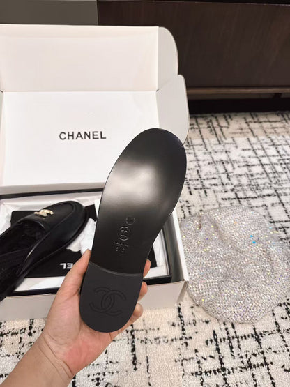 SLINGBACK LOAFER IN BLACK CALFSKIN AND SHEARLING