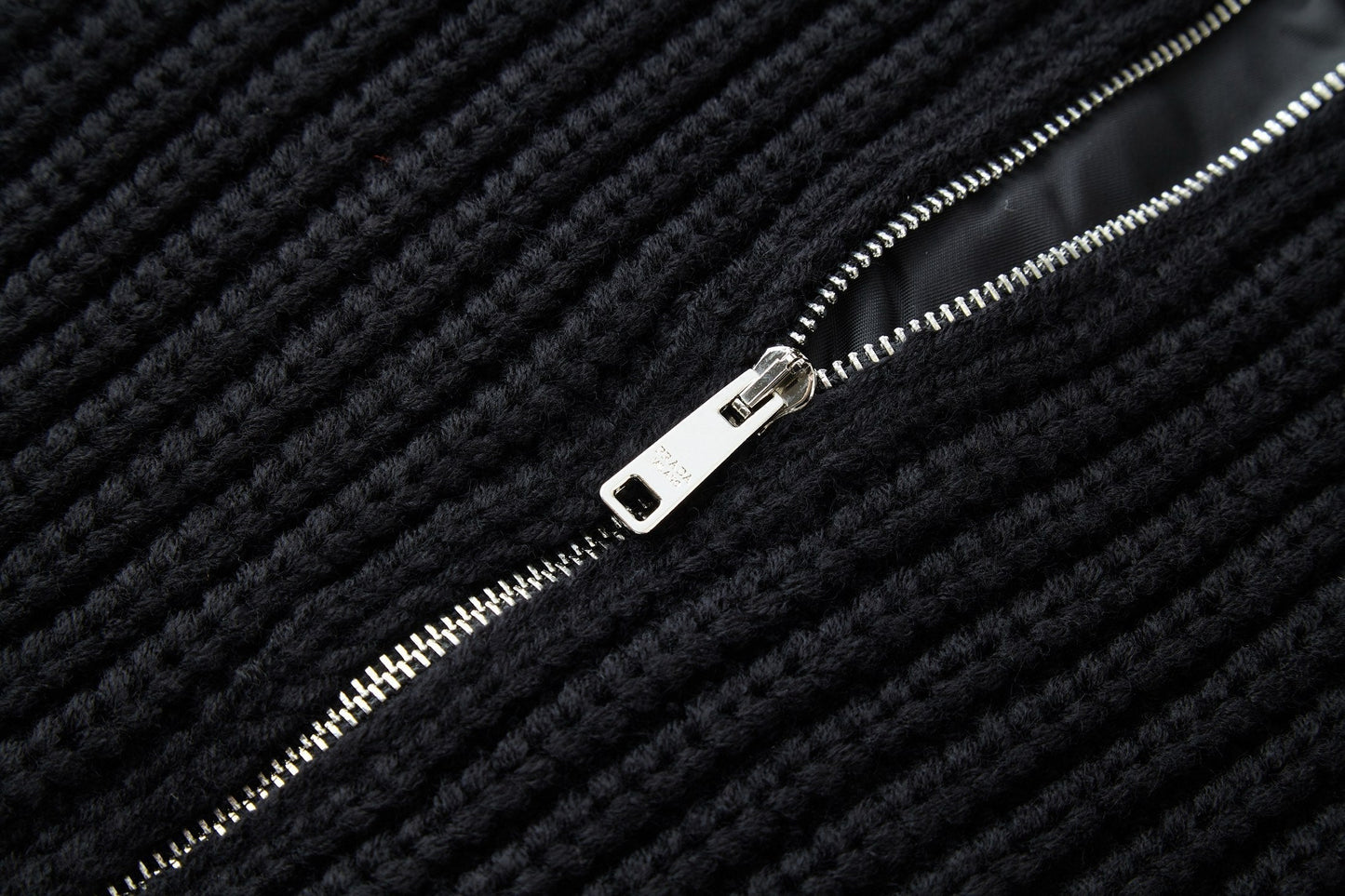 PRADA ZIP-UP IN BLACK WOOL