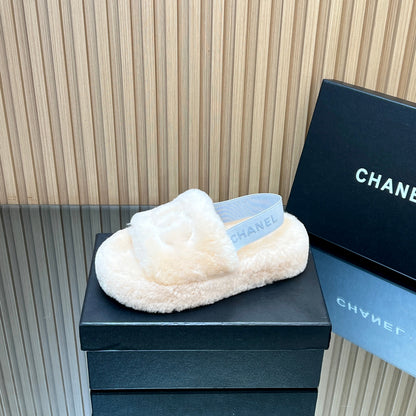CHANEL 25S THICK-SOLED FURRY SLIPPERS WITH ELASTIC STRAPS IN BEIGE FUR