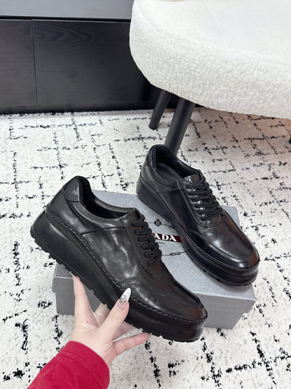 PRADA 26S SNEAKERS IN BLACK SHINY CALFSKIN