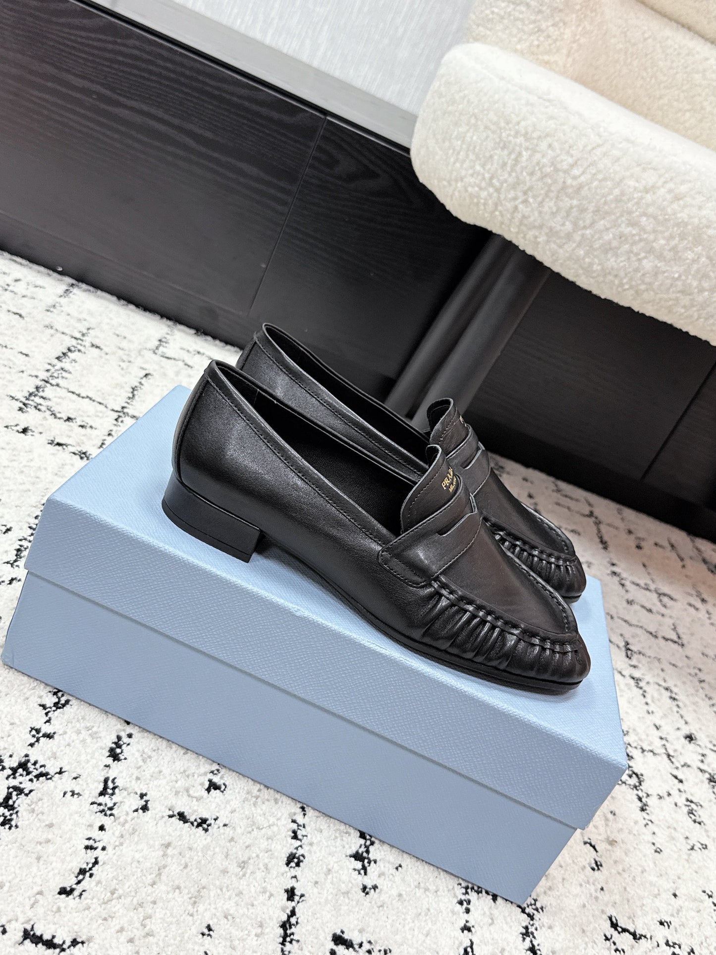 PRADA 26S LOAFERS 25MM IN BLACK CALFSKIN