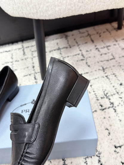 PRADA 26S LOAFERS 25MM IN BLACK CALFSKIN