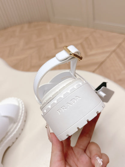 PRADA 25S CRISSCROSS SANDALS IN WHITE CALFSKIN