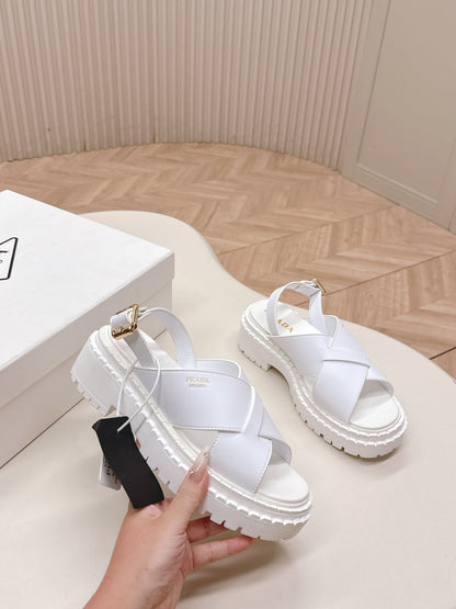 PRADA 25S CRISSCROSS SANDALS IN WHITE CALFSKIN