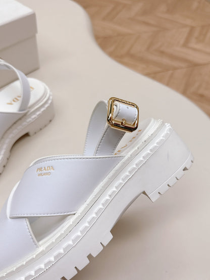PRADA 25S CRISSCROSS SANDALS IN WHITE CALFSKIN
