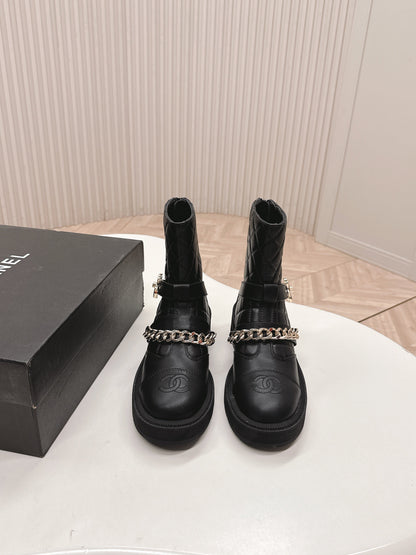 CHANEL ANKLE BOOTS 25S IN BLACK LAMBSKIN EMBOSSED LOGO WITH GOLD HARDWARE