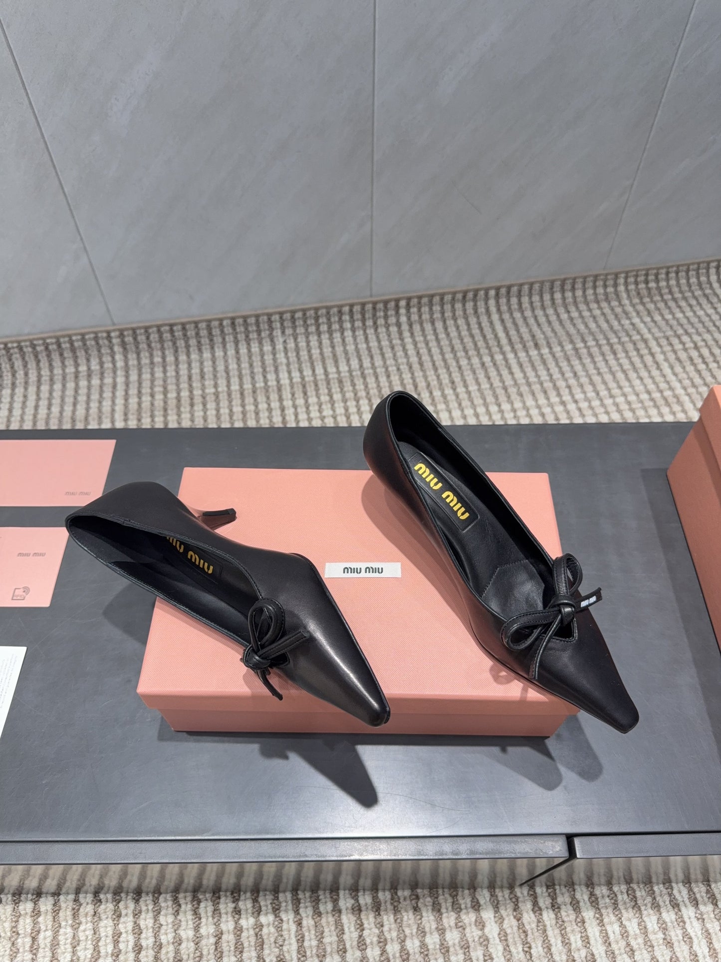 MIUMIU 26S POINTED TOE PUMPS 55MM IN BLACK CALFSKIN WITH BOW