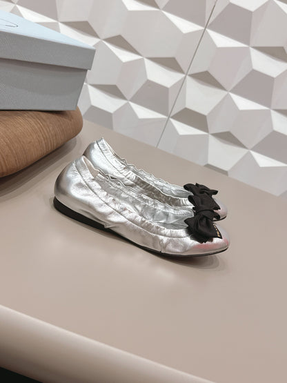 PRADA 26S ROUND TOE FLATS WITH BOW IN SILVER CALFSKIN
