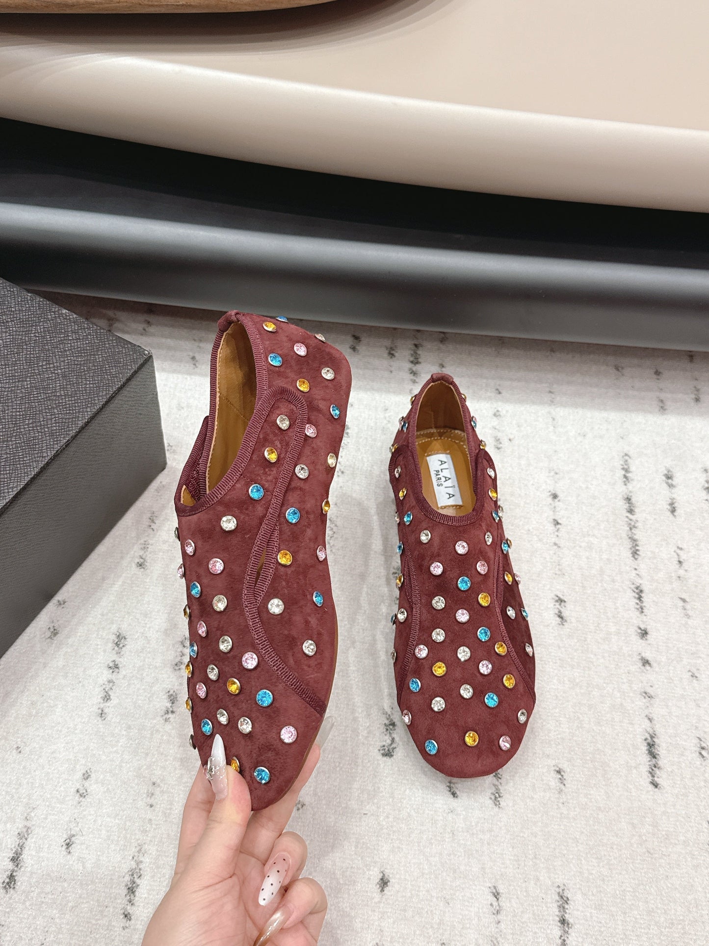 ALAIA 26S EMBELLISHED FLATS IN BROWN SUEDE