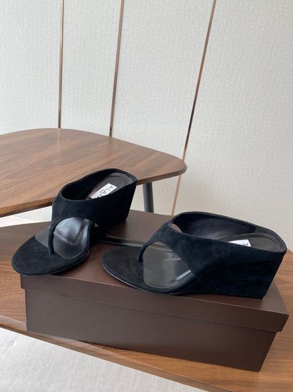 ALAIA WEDGE THONG SANDALS 25S IN BLACK SUEDE