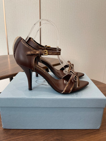 PRADA 26S HIGH HEEL SANDALS 85MM IN CHOCOLATE BROWN CALFSKIN WITH BOW