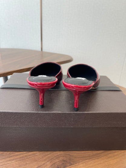ALAIA 26S HEELED MULES 50 MM IN DARK RED GLOSSY CALFSKIN