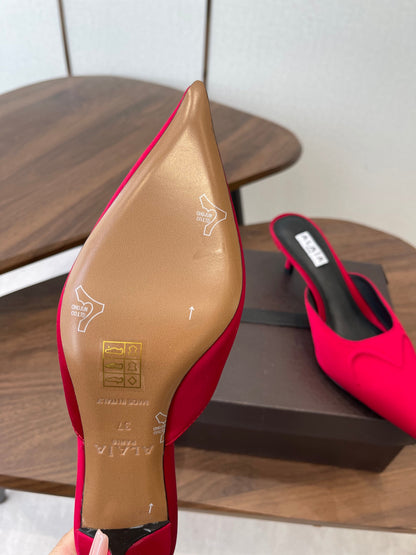ALAIA 26S HEELED MULES 50 MM IN RED FABRIC