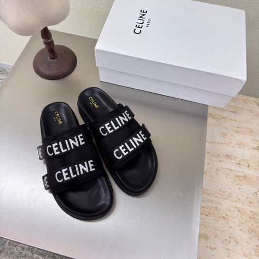 CELINE 25S FLAT SANDALS ARC DE TRIOMPHE IN BLACK CALFSKIN AND CANVAS