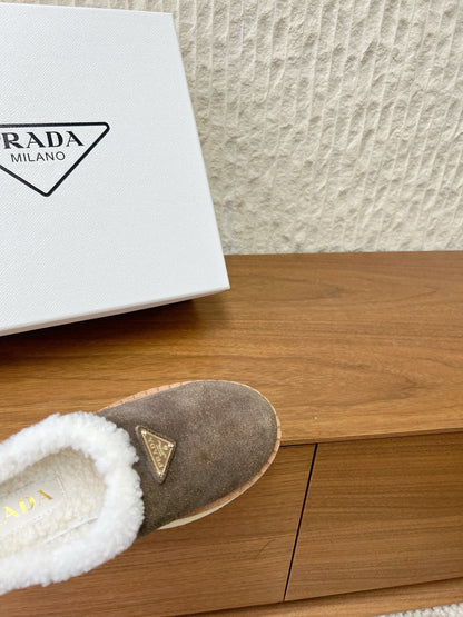 PRADA 25S PLATFORM FUR-LINED MULES IN EARTH BROWN SUEDE