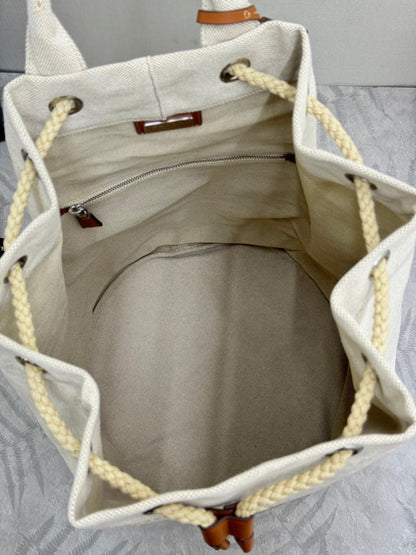 PRADA 25S DRAWSTRING BACKPACK 55 IN BEIGE CANVAS LINEN SILVER HARDWRE