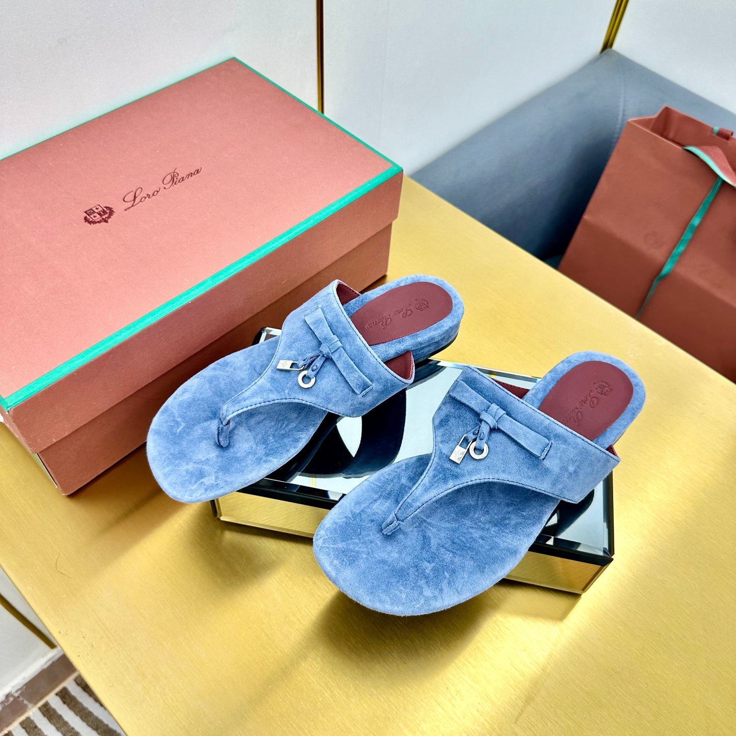 FLIP FLOPS IN BLUE SUEDE AND HARDWARE SILVER