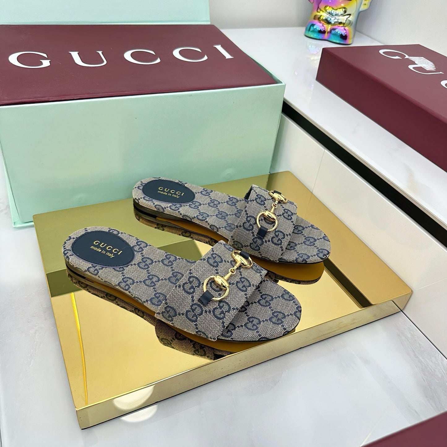 GG SLIDES IN STONE GREY WITH GOLD HARDWARE