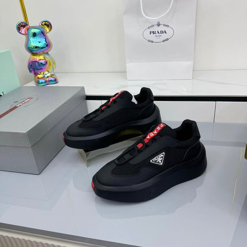 PRADA 25S CROSS LACED SNEAKERS IN BLACK CALFSKIN