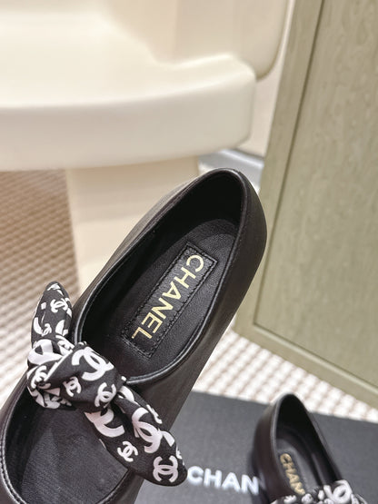 CHANEL 25S MARY JANES IN BLACK SHEARLING AND GROS GRAIN