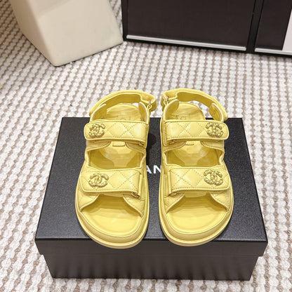 CHANEL 26S QUILTED DAD SANDALS IN YELLOW CALFSKIN